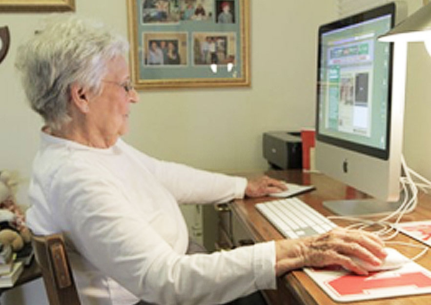 senior using computer