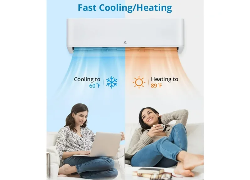 Technician preparing a ductless mini-split heat pump for winter heating in a Calgary home